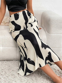 Eleganter Rock mit fließenden Falten, perfekt für einen raffinierten und femininen Look - Arlene