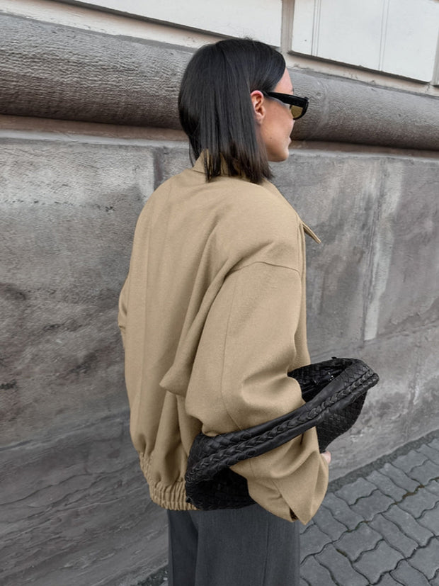 Jacke mit Reverskragen, Knopfverschluss und Taschen