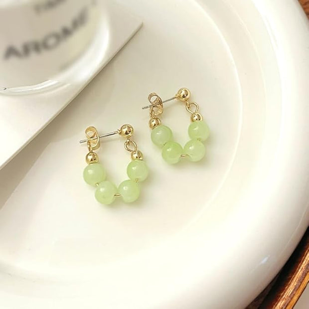 Lime Twist Perlen Creolen Ohrringe Liora Elegant Modern Leichtes Design Mit Goldfarbenem Glanz