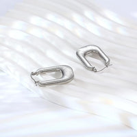 Ohrringe Luxe Arches Thalia Elegante Zeitgenössische Rechteckige Form Mit Sanft Abgerundeten Linien Und Goldglanz