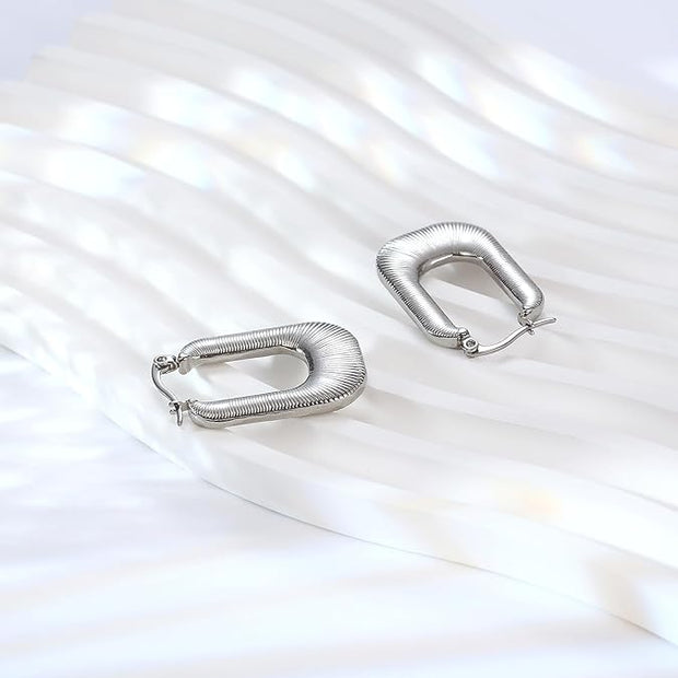 Ohrringe Luxe Arches Thalia Elegante Zeitgenössische Rechteckige Form Mit Sanft Abgerundeten Linien Und Goldglanz