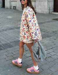 Jeansjacke mit Blumenmuster, Taschen und lockerer Passform