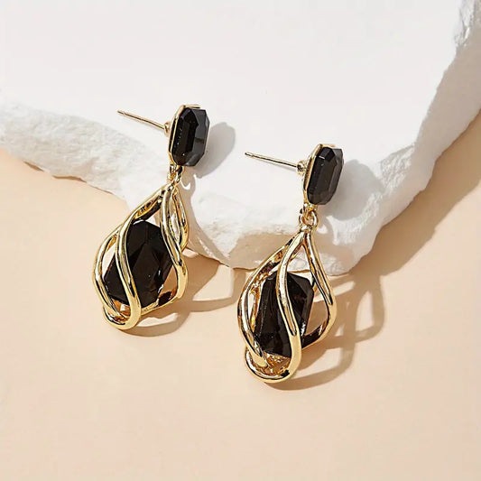 Tropfenförmige Ohrringe Midnight Embrace Basma Eleganter Goldschimmer Und Dunkle Kristalle Für Festliche Anlässe