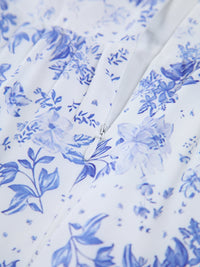 Clarise - Langes Kleid mit Reißverschlüssen und Blumentaschen