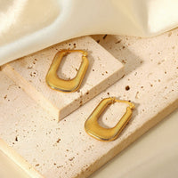 Ohrringe Luxe Arches Thalia Elegante Zeitgenössische Rechteckige Form Mit Sanft Abgerundeten Linien Und Goldglanz