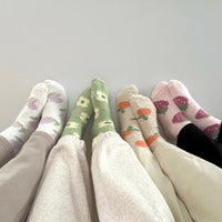 Flauschige Socken im Set mit lustigen Motiven
