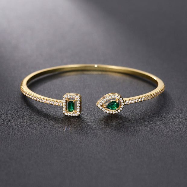 Verdeira Armband Caruso Wistaria Elegantes Goldene Strukturarmband Mit Zirkonen Grünen Steinen Tropfen- Und Rechteckformen
