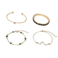 Vier Elegante Goldene Armband-Set Mit Grünen Details Smeralda - Minimalismus Und Strahlender Glanz