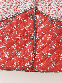 Steppjacke mit Blumenmuster und Ethno-Muster im Steppdesign