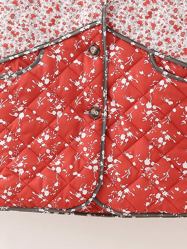 Steppjacke mit Blumenmuster und Ethno-Muster im Steppdesign
