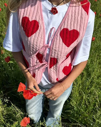 Jeansweste mit figurbetontem Schnitt, Schleifendetails und V-Ausschnitt