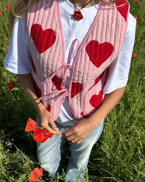 Jeansweste mit figurbetontem Schnitt, Schleifendetails und V-Ausschnitt