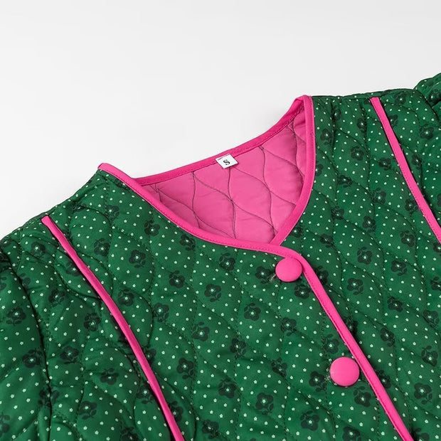 Steppjacke mit Blumenmuster und rosa Schleifen