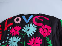 Jeansjacke mit Graffiti-Print und Taschen