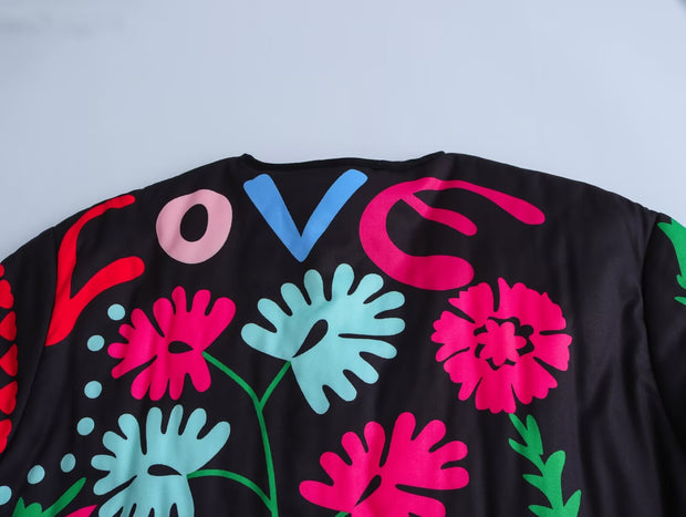 Jeansjacke mit Graffiti-Print und Taschen