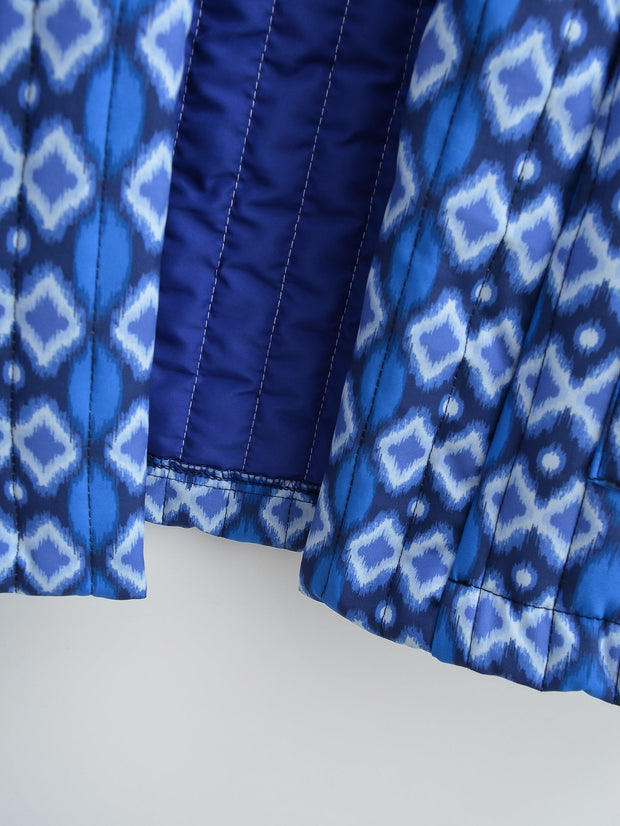 Steppjacke mit Blumenmuster, geometrischem Muster und Taschen