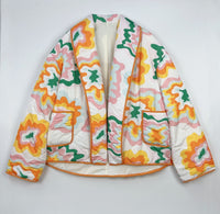 Steppjacke mit farbigem Patchwork-Print