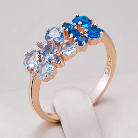 Eleganter Ring Aus Blauem Und Weißem Kristall Mit Roségoldfassung Und Modernem Design Oceana