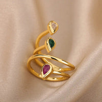 Edelstein Spiralring Inaya Mit Drei Tropfenförmigen Steinen In Transparent Grün Rot Gold Finish