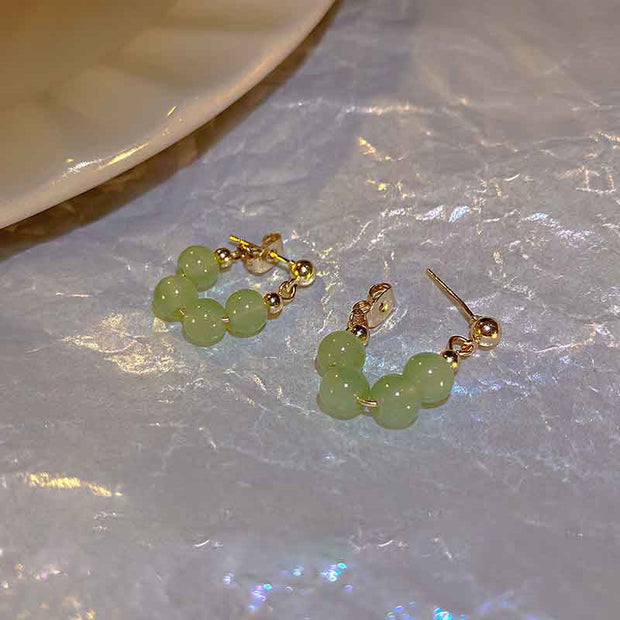 Lime Twist Perlen Creolen Ohrringe Liora Elegant Modern Leichtes Design Mit Goldfarbenem Glanz