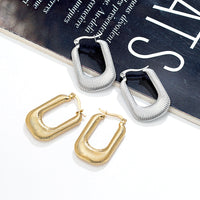 Ohrringe Luxe Arches Thalia Elegante Zeitgenössische Rechteckige Form Mit Sanft Abgerundeten Linien Und Goldglanz