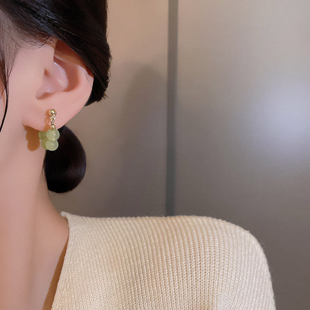 Lime Twist Perlen Creolen Ohrringe Liora Elegant Modern Leichtes Design Mit Goldfarbenem Glanz
