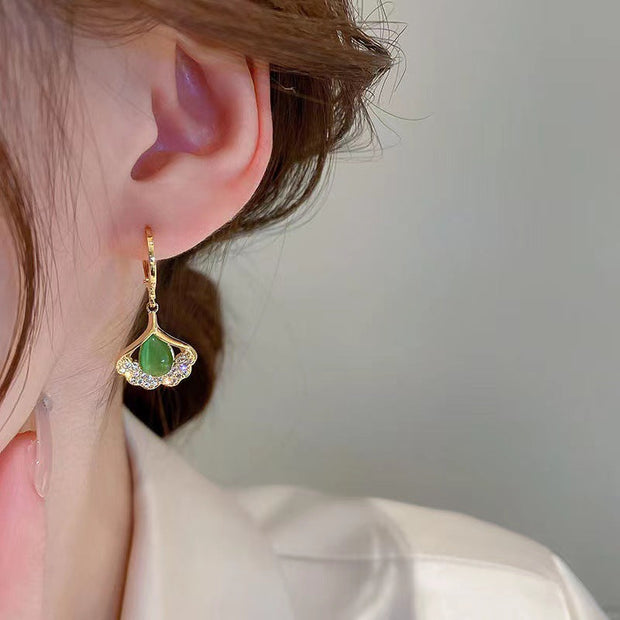 Fantastische Tropfenohrringe Nadia Elegante Perlmutt Details Mit Glitzernden Steinen Für Natürliche Ausstrahlung