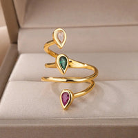 Edelstein Spiralring Inaya Mit Drei Tropfenförmigen Steinen In Transparent Grün Rot Gold Finish
