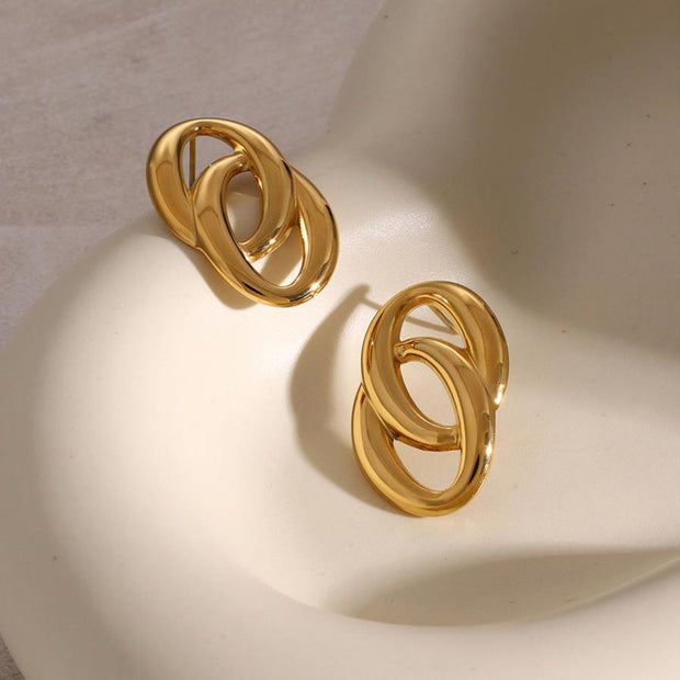 Ohrringe Double Deluxe Noor Verschlungenes Design Mit Zwei Polierte Ringe Für Alltag Und Anlässe
