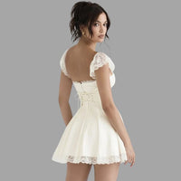 Evelina - Kleid mit Spitzenbesatz und fließendem Rock