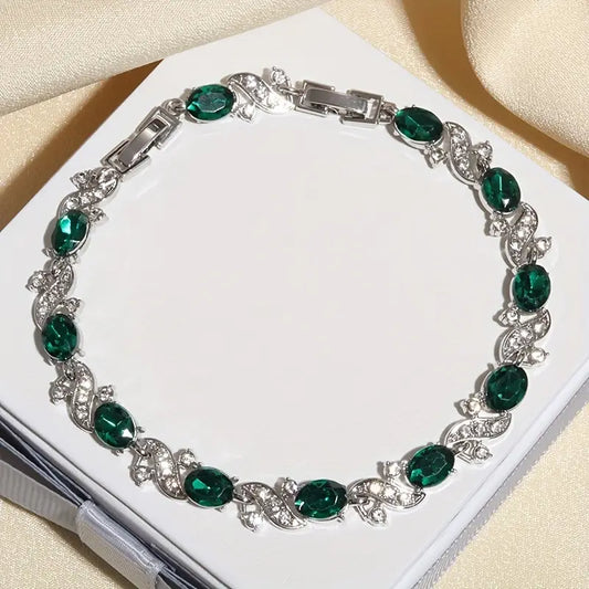 Silberarmband Mit Grünen Ovalen Steinen Und Kubische Zirkonien Verzierungen Lorena Elegantes Schmuckstück
