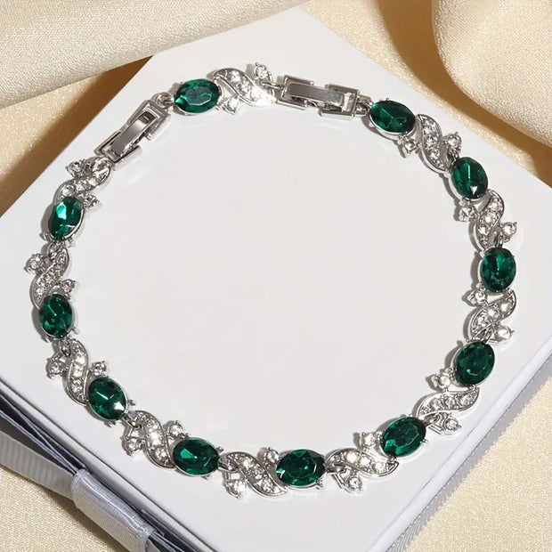 Silberarmband Mit Grünen Ovalen Steinen Und Kubische Zirkonien Verzierungen Lorena Elegantes Schmuckstück
