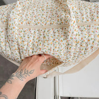 Daisy Wickeltasche mit Blumenmuster