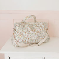 Daisy Wickeltasche mit Blumenmuster