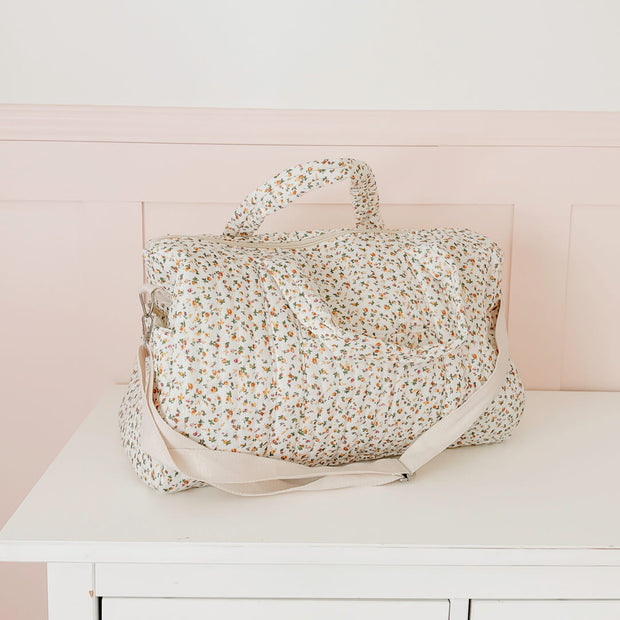 Daisy Wickeltasche mit Blumenmuster