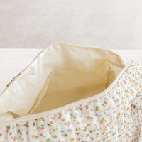 Daisy Wickeltasche mit Blumenmuster
