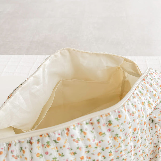 Daisy Wickeltasche mit Blumenmuster