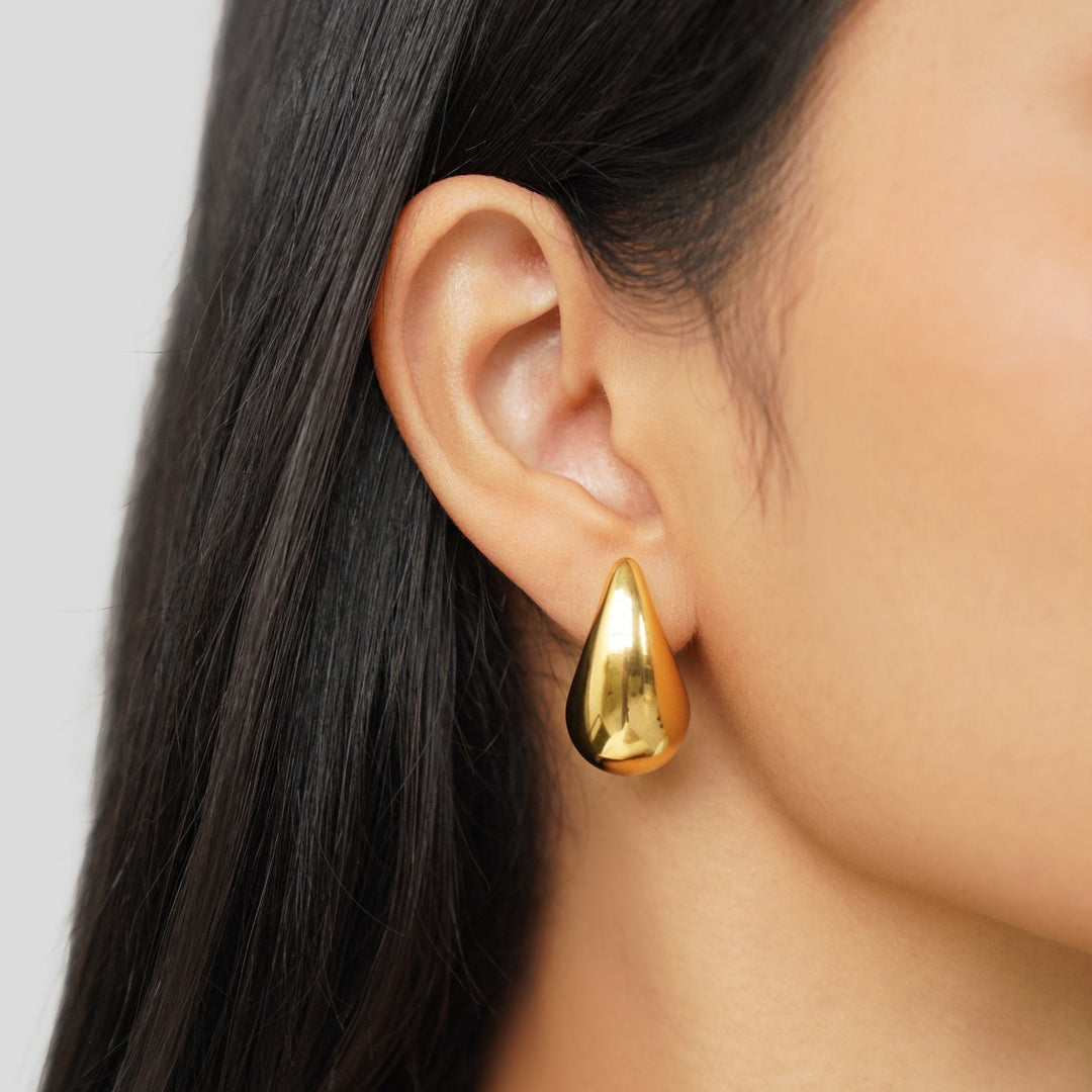 Goldene Tropfenohrringe Ame Ondina Schlichtes Minimaldesign Trifft Moderne Eleganz Ideal Für Formelle Und Alltagslook