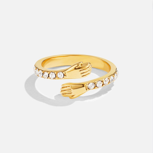 Goldring für Damen Ursula Verstellbarer Bandring mit Zwei Umarmende Hände Symbolik und Funkelnde Kristalle