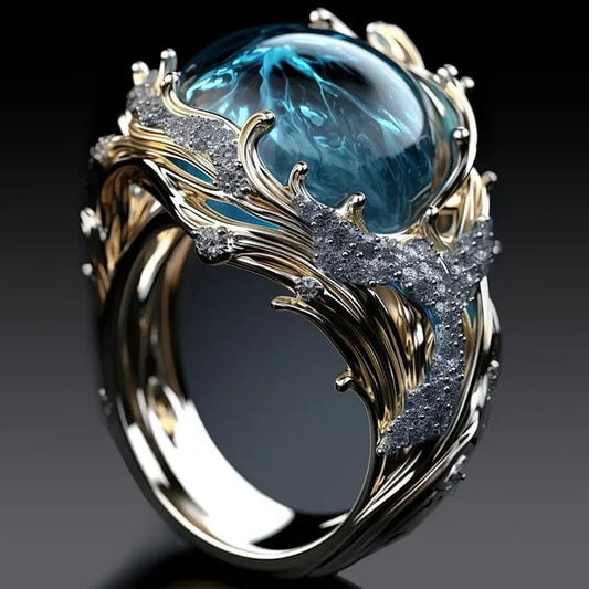 Vintage Ring Aus Ozeankristall Mit Zentralem Blauem Stein In Organischem Wellendesign Und Transparenter Tiefe Gaia