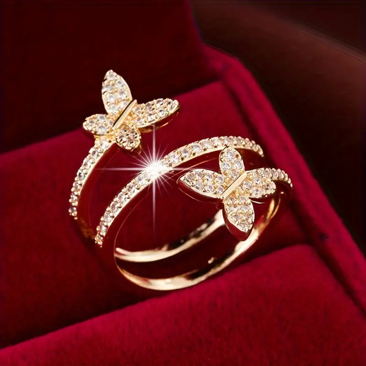 Verstellbarer Ring Mit Zirkonia In Schmetterlingsform Aus Goldfarbenem Metall Für Damen Von Ira Elegant Und Luxuriös