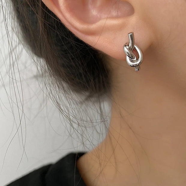 Ohrringe Duo Gnarled Patrizia Modernes Doppelknoten Design Aus Poliertem Metall Für Elegante Looks