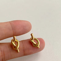Ohrringe Duo Gnarled Patrizia Modernes Doppelknoten Design Aus Poliertem Metall Für Elegante Looks