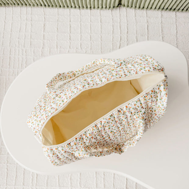 Daisy Wickeltasche mit Blumenmuster