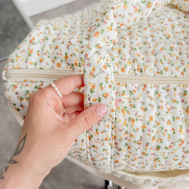 Daisy Wickeltasche mit Blumenmuster