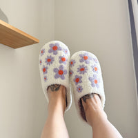 Slip-on Hausschuhe mit lila Blumen